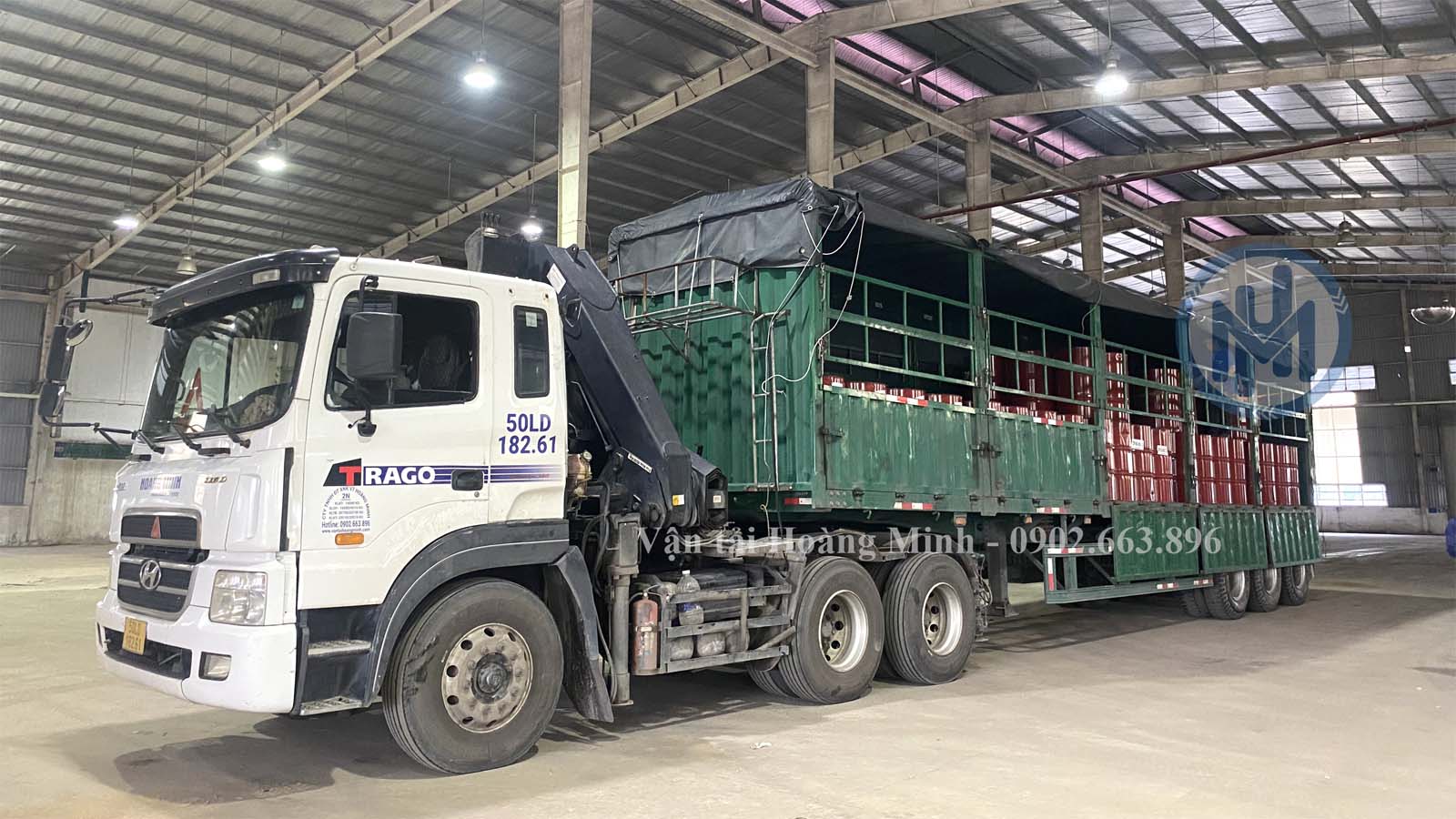 Xe container vận chuyển hàng phuy sắt